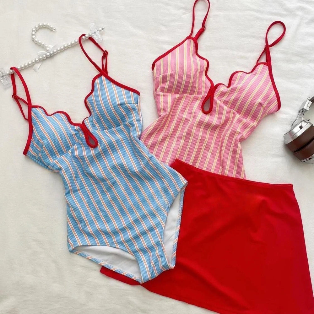 Blue striped bikini top and red skirt