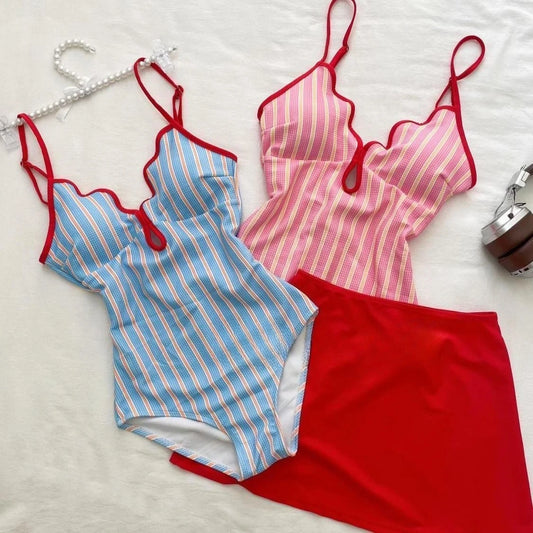 Blue striped bikini top and red skirt