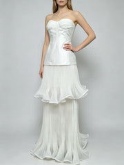 Strapless pleated ruffle gown standing side view