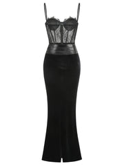 Black dress with mesh bodice and leather accents on a white background
