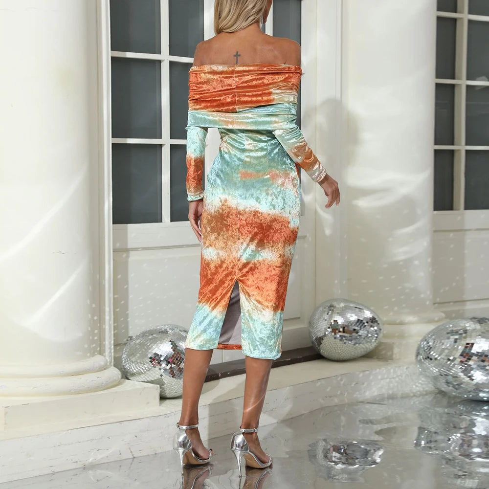 Woman wearing a colorful off-shoulder dress in a decorative setting with disco balls.