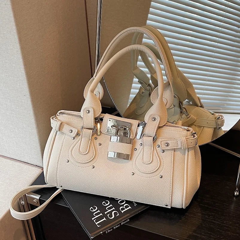Creamy white satchel bag with lock detail