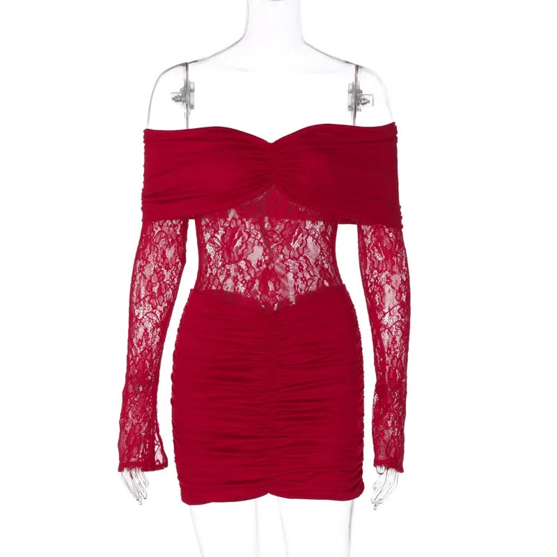 Red lace dress on a mannequin against a white background