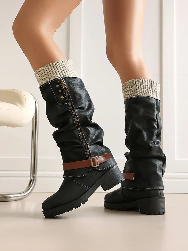 Detail of round toe zipper buckle boots