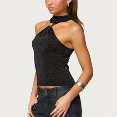 Woman wearing a black one-shoulder top with a plain background