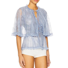 Sheer lace cape blouse with tie-front and ruffled hem in blue