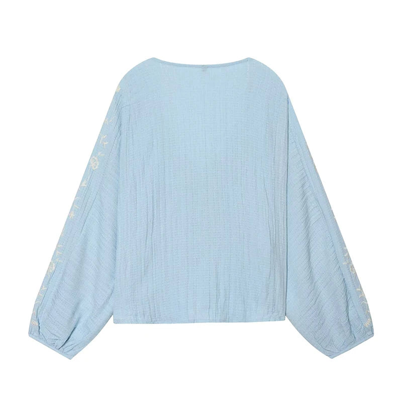 Back view of Embroidered V-Neck Pleated Blouse