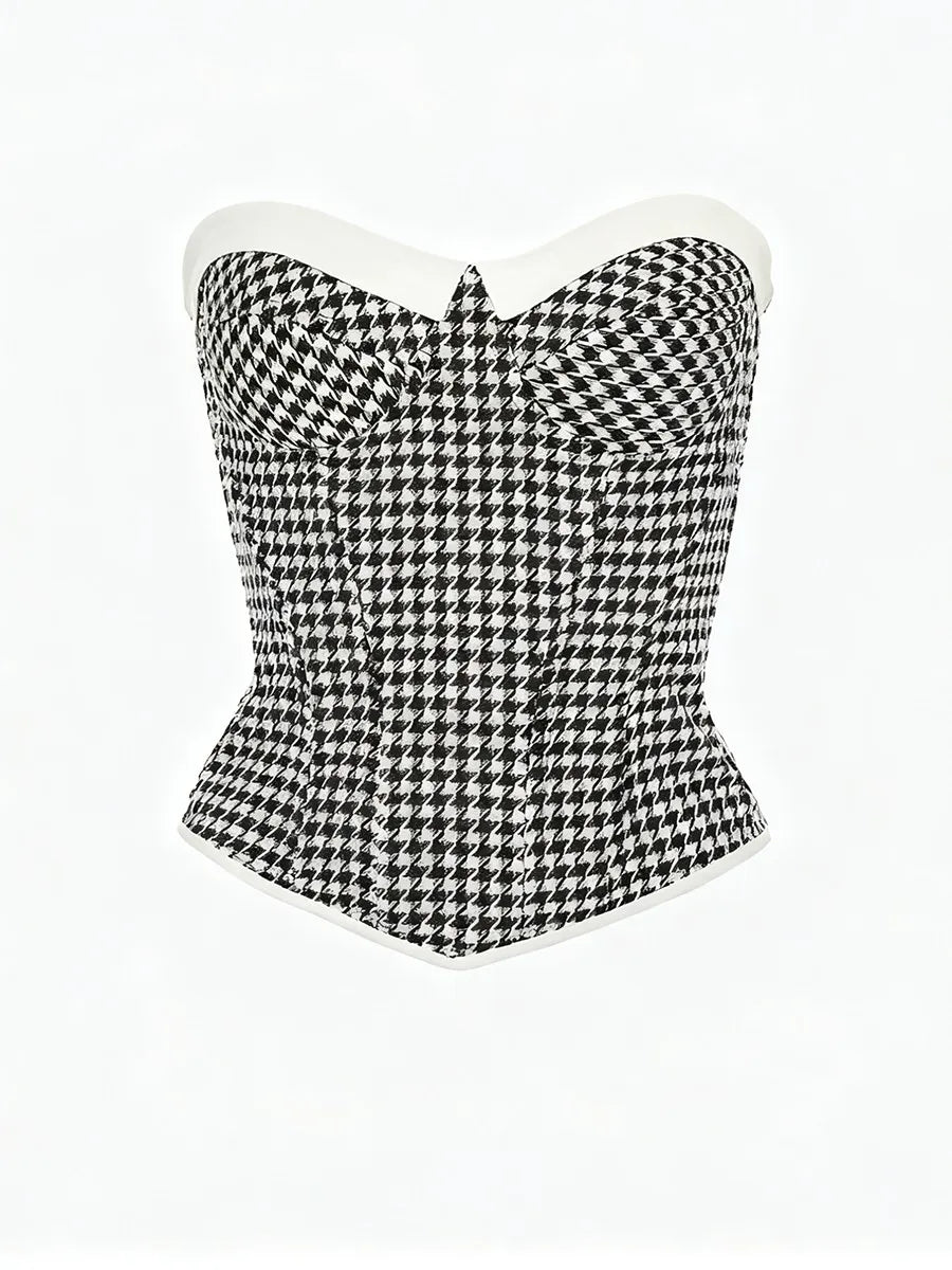 Black and white houndstooth patterned corset on a white background