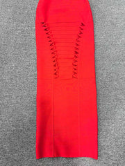 Red dress with cut-out design on a gray background