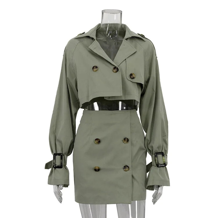 Green trench coat on a mannequin against a white background