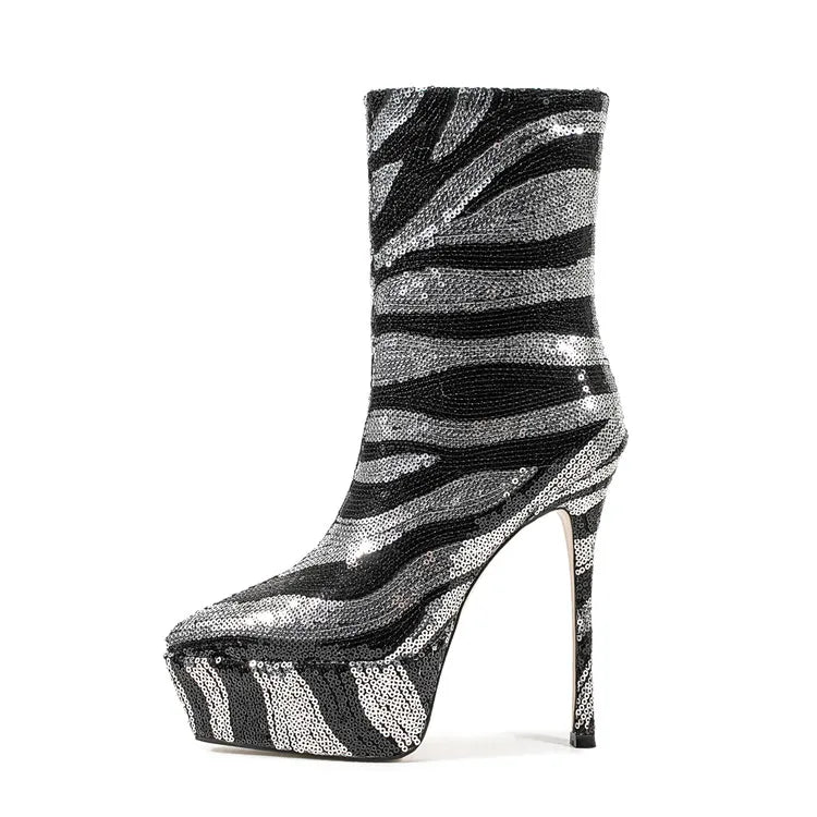 Black and silver striped high-heeled boot on a white background