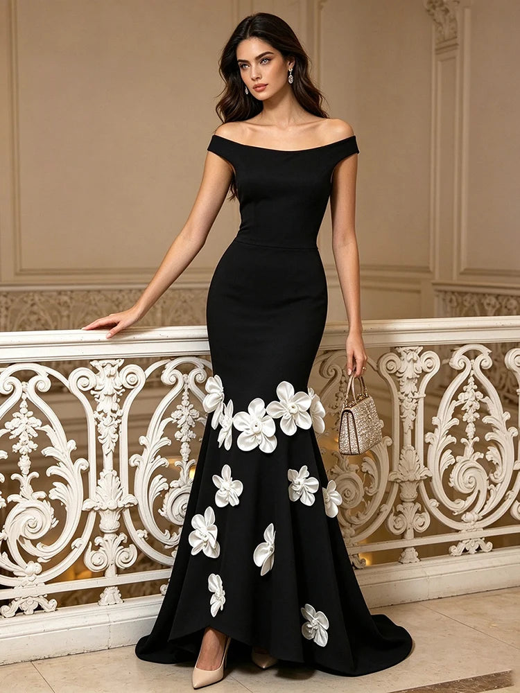 Black off-shoulder maxi dress with 3D floral appliqués