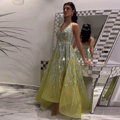  A model wearing the lemon green halter dress, showcasing its elegant silhouette and vibrant color. Golden Atelier 2