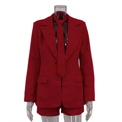 Red suit jacket and shorts on a mannequin against a white background