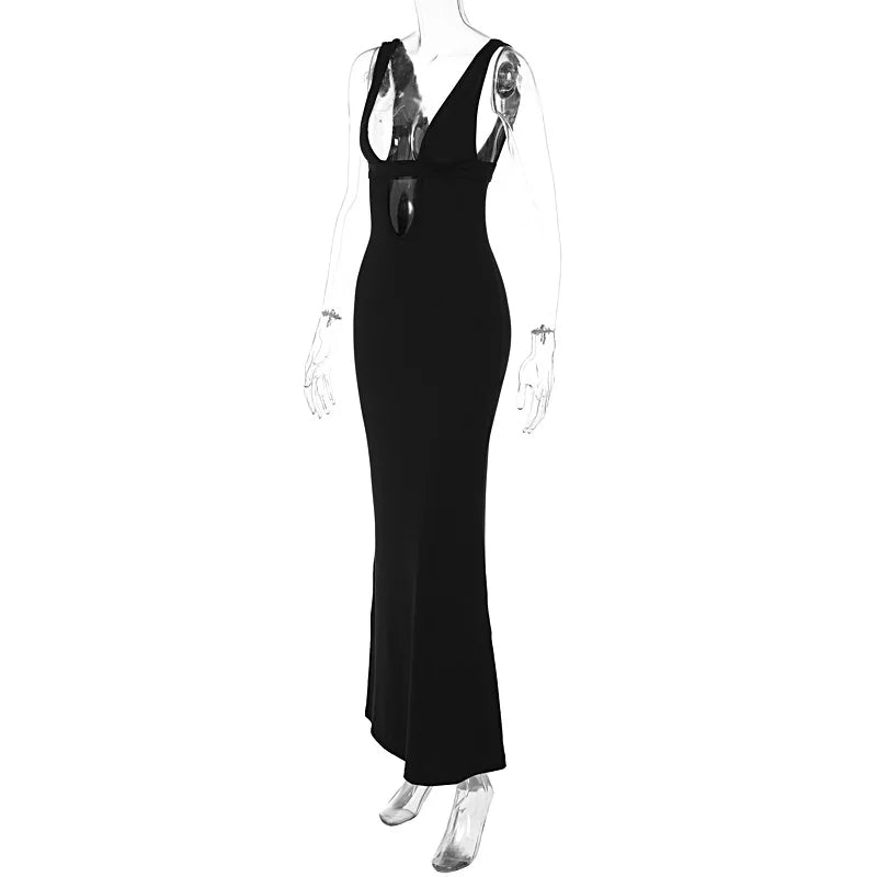 Black dress on a mannequin against a white background