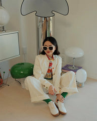 A Model sitting  in  cozy room with a modern LED table lamp providing warm light D