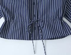Striped stand collar button front blouse waist detail
