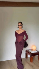 A person styled in an off shoulder long sleeve maxi dress with ruched waist detail and accessories.