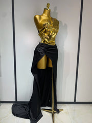 Gold metallic corset top and black draped skirt two-piece set with side view