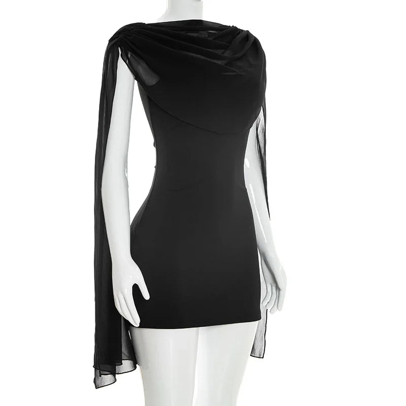 Black dress with sheer sleeves on a mannequin against a white background