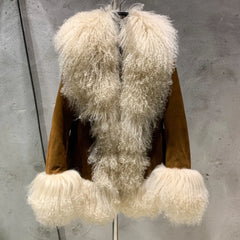 Mannequin wearing a brown jacket with white fur trim against a gray background