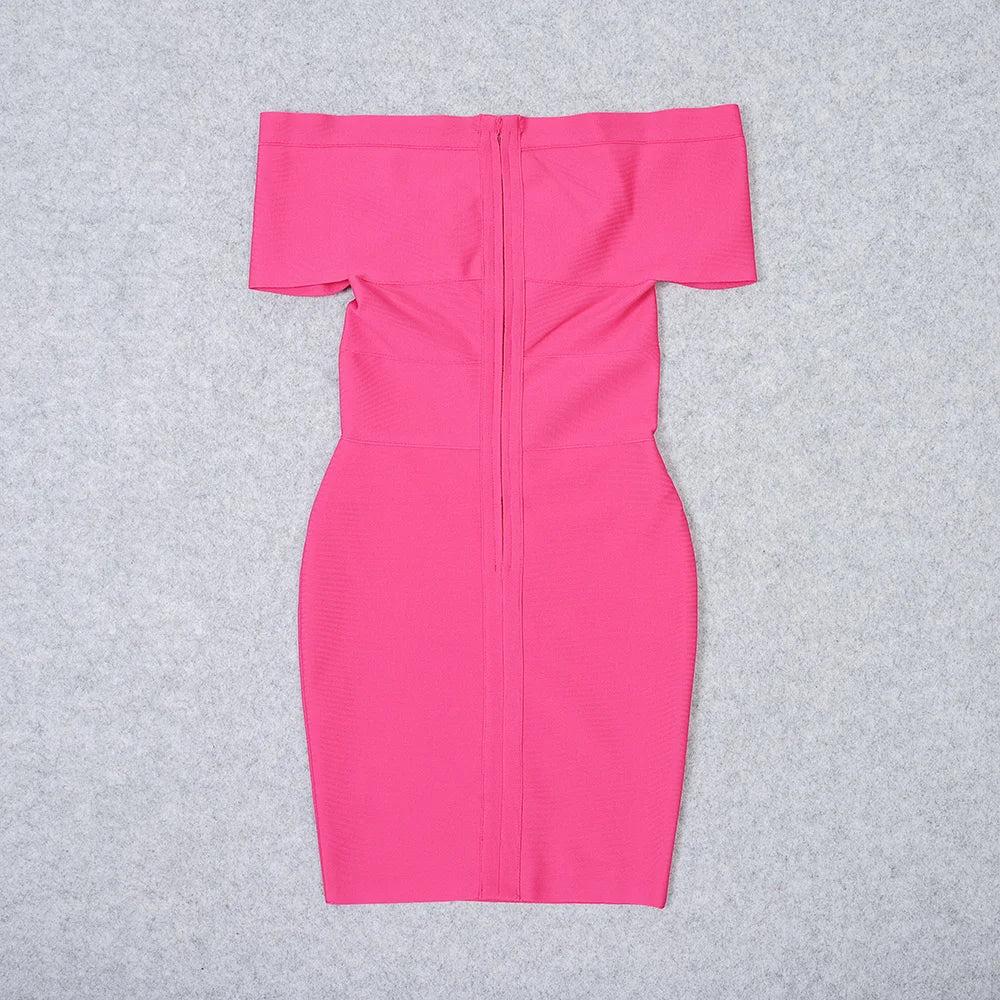 Pink off-shoulder dress on a gray background