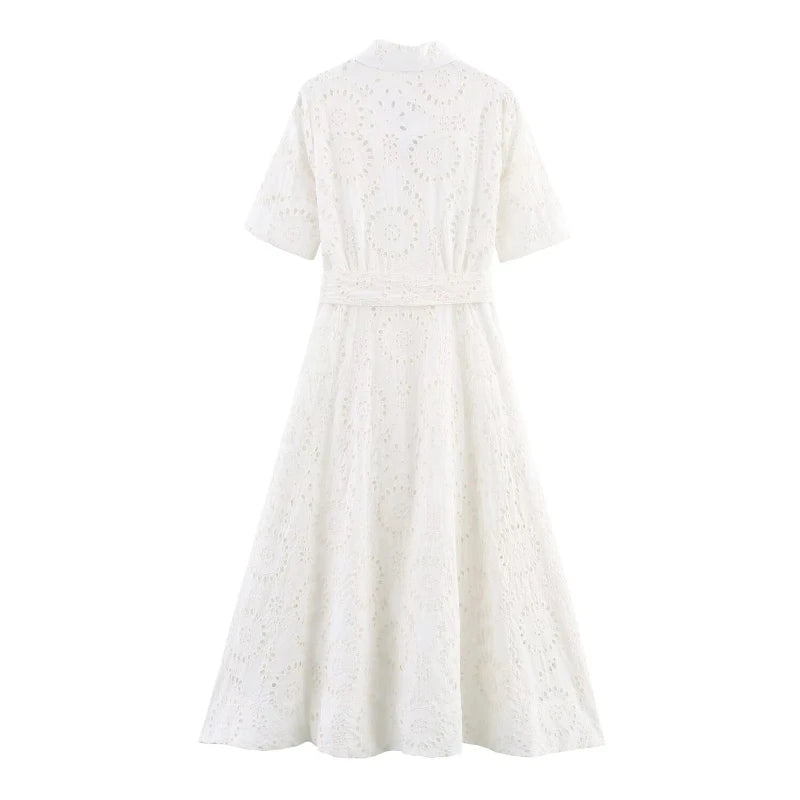 White dress with a subtle pattern on a white background