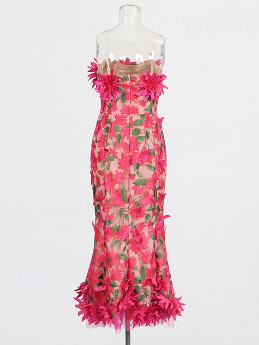 Mannequin wearing a pink floral dress 