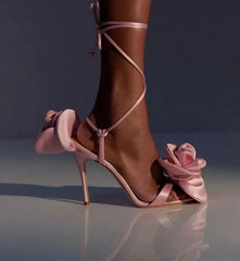 Model wearing white 3D flower ankle strap satin sandals by Golden Atelier, ideal for weddings and special events. Pink 2