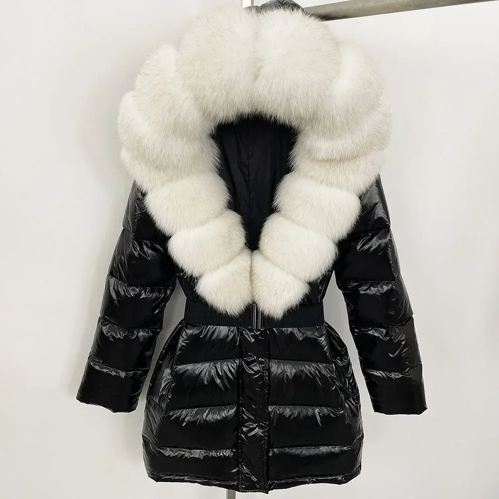 Black puffer jacket with a large white fur collar 