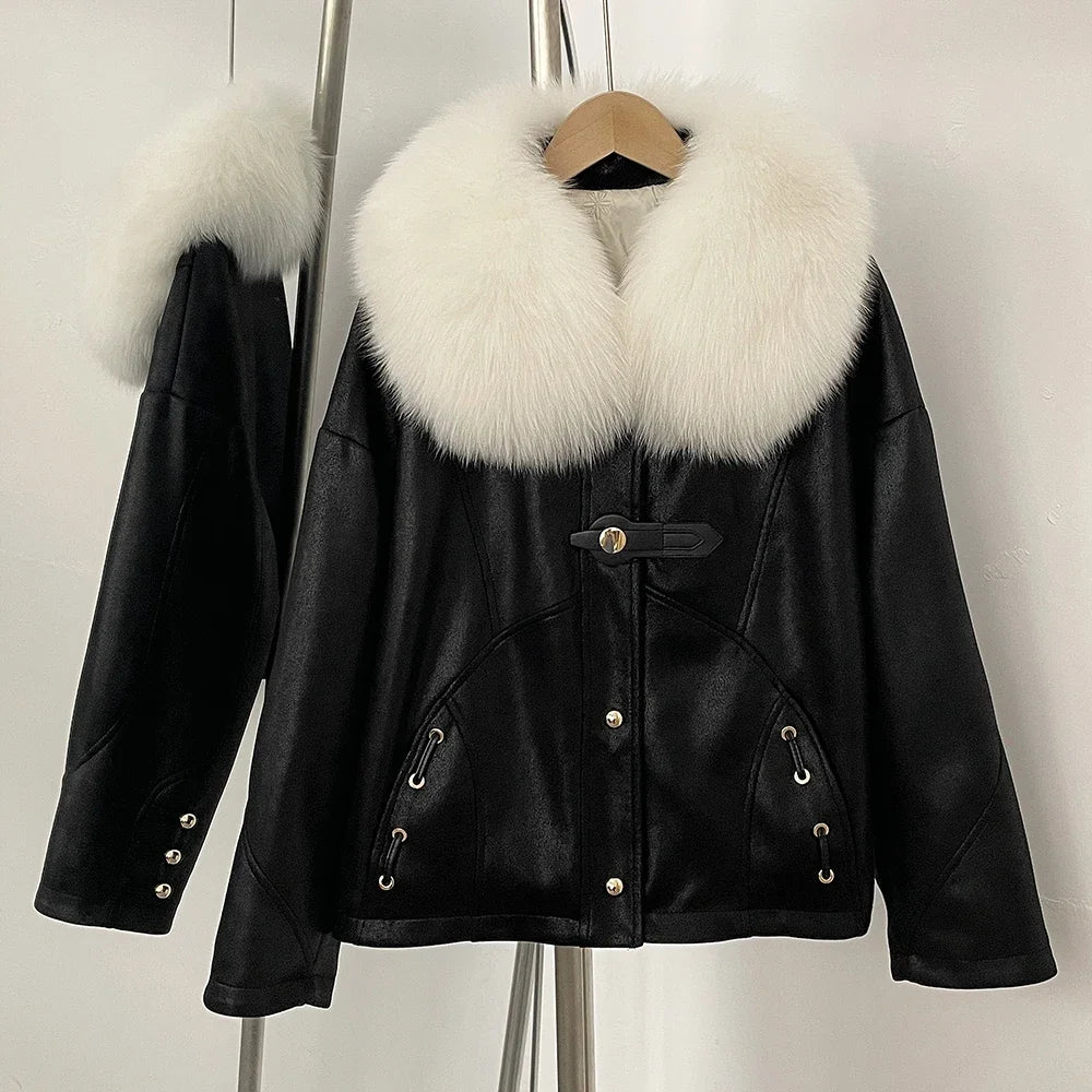 Black leather jacket with white fur collar on a hanger against a plain background