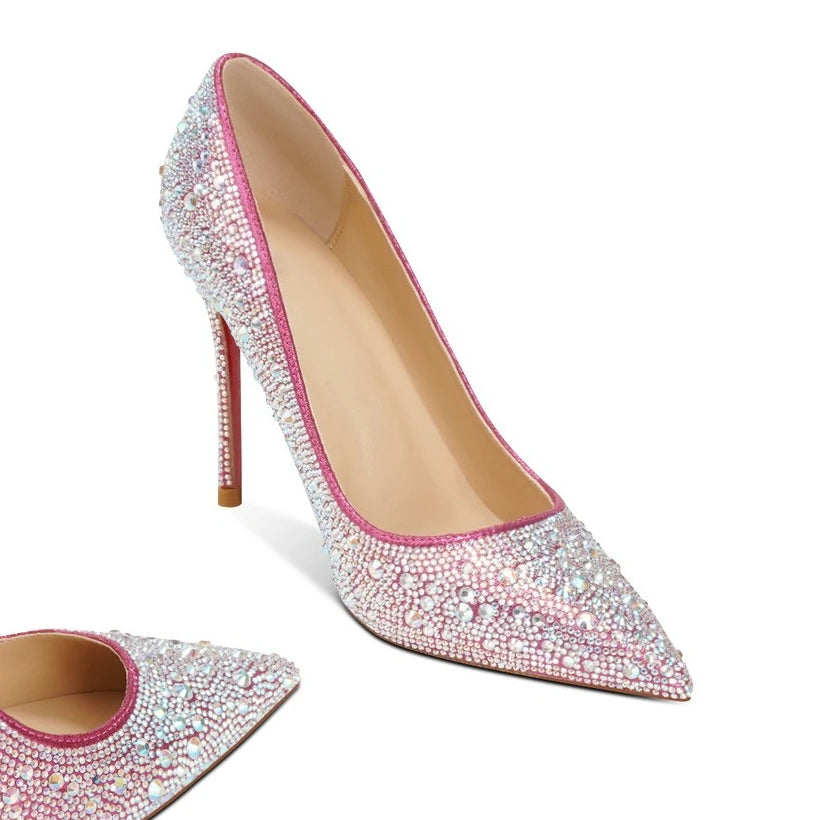 Pink high-heeled shoes with crystal embellishments