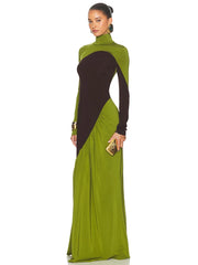 Woman wearing a green and black dress