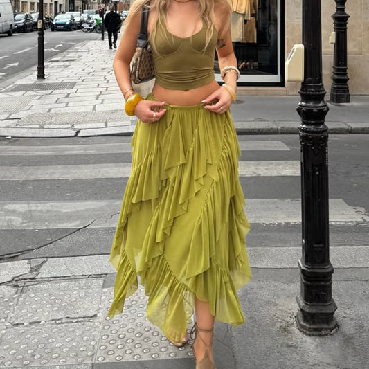 Flowing ruffled asymmetric hem maxi skirt on street