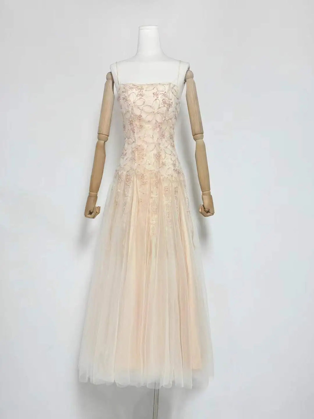 Floral embroidered tulle square neck dress on mannequin