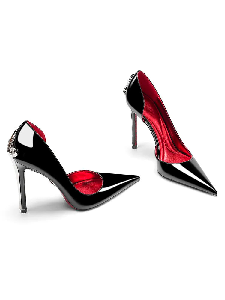 Black and red high-heeled shoes on a white background