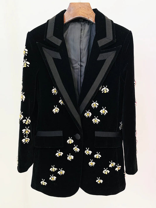 Black velvet blazer with beaded bee embellishments and ribbon lapels.