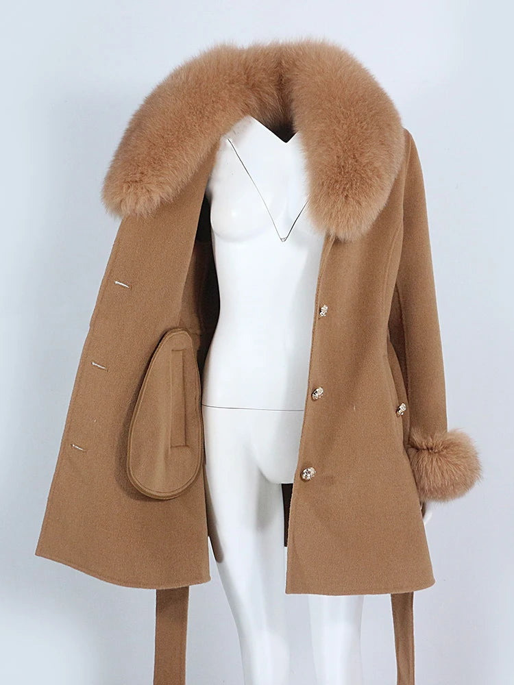 Brown coat with fur collar on a mannequin against a white background