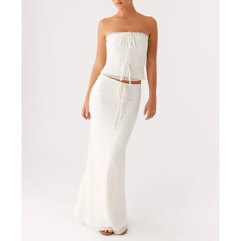 White strapless top and wide-leg pants on a white background