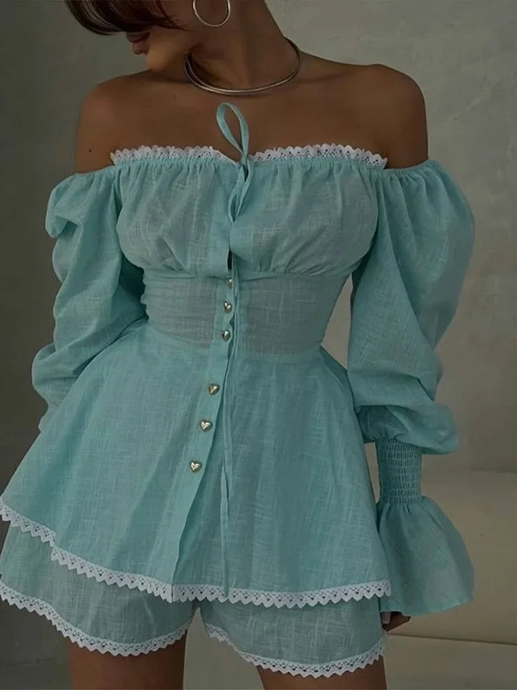 Light blue off-shoulder dress with puffed sleeves on a neutral background