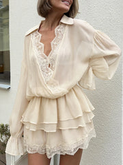 Beige mini dress with cross neck and lace trim