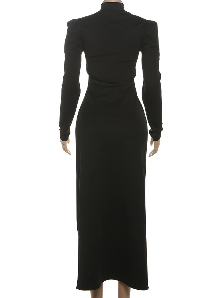 Black dress on a mannequin against a white background