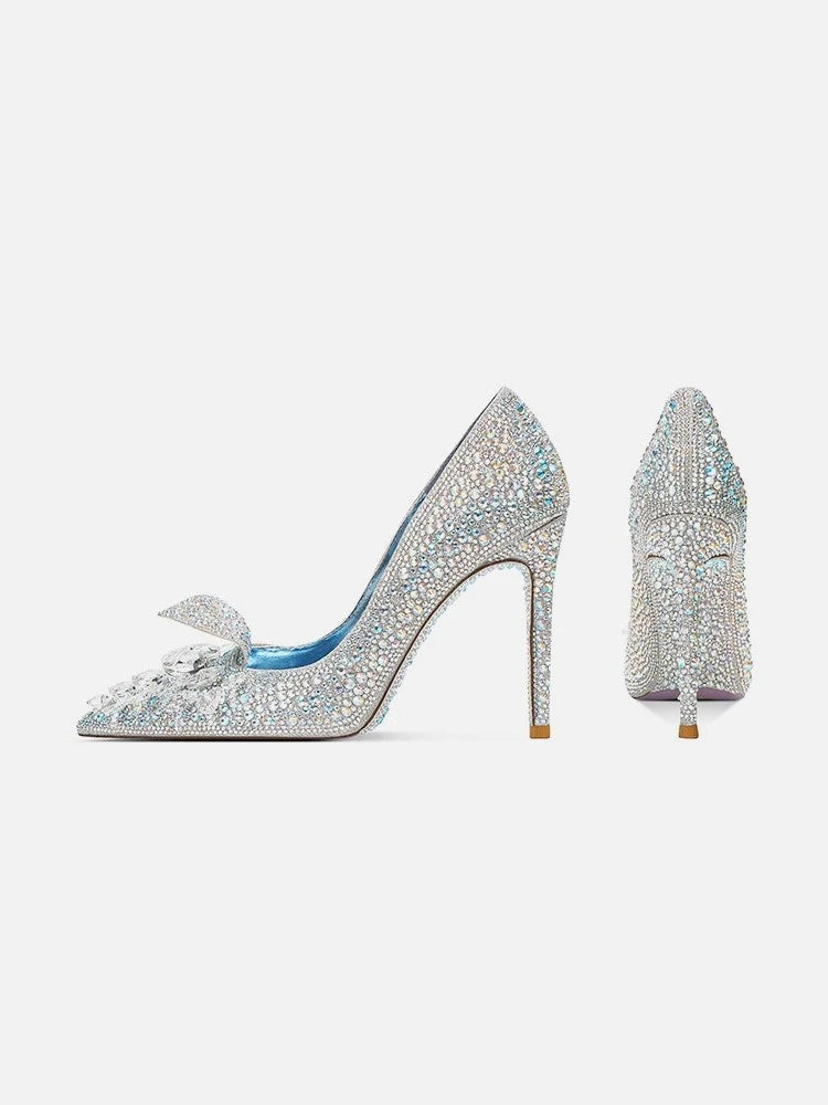 Pair of sparkling high-heeled shoes on a white background