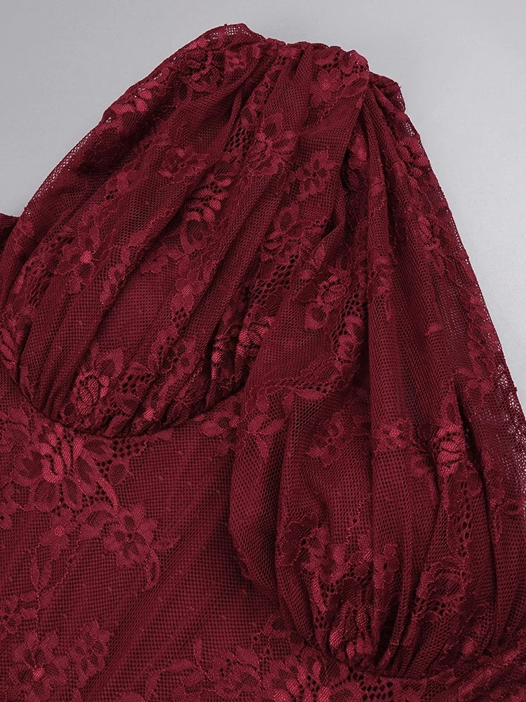 Close-up of a red lace garment on a light gray background