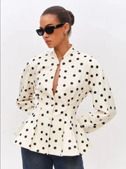 Polka dot peplum blazer with puff shoulders detail