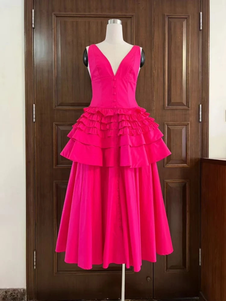 Pink dress on a mannequin against a wooden door background