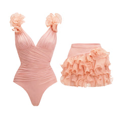 Ruched V-neck swimsuit with floral shoulder details and ruffled mini skirt