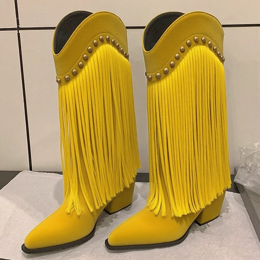 Yellow pointed toe square heel knee high boots with fringe and studs