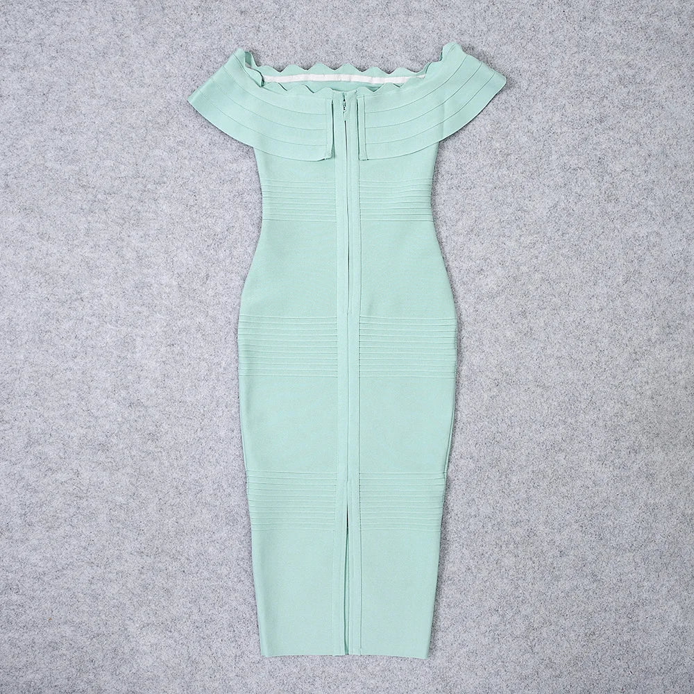 Mint green dress with short sleeves on a gray background