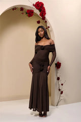 Close-up of rose appliqué and ruched waist design